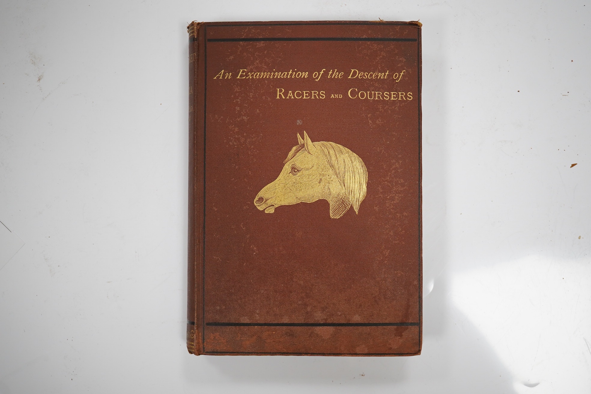 Upton, Roger D. - Newmarket and Arabia: an examination of the descent of racers and coursers. hand coloured frontis. and 4 folded tables; original gilt pictorial cloth, cr. 8vo. 1873